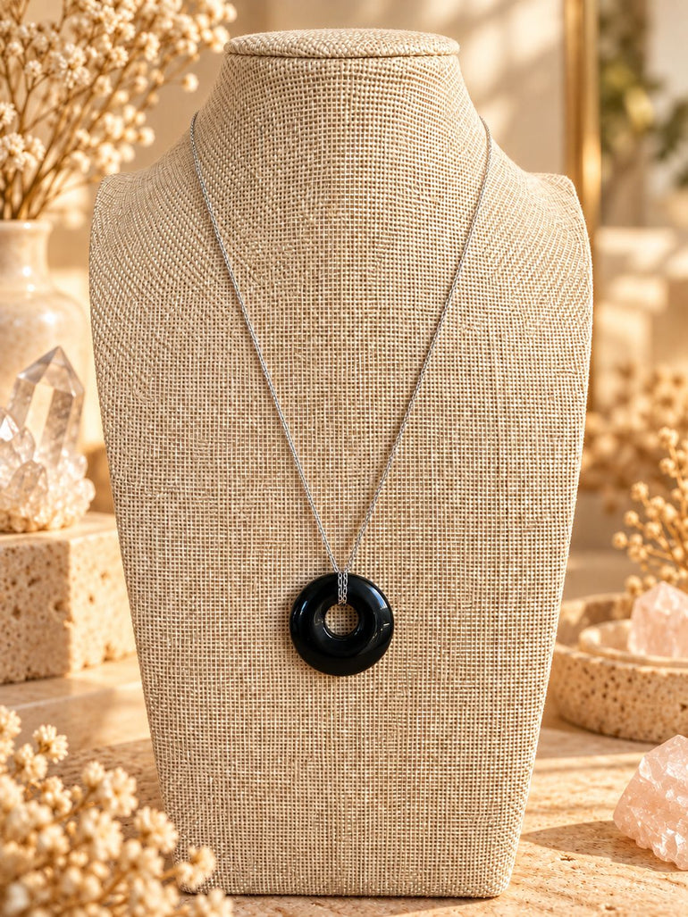 Colgante donut de obsidiana pulida – Prismatica House