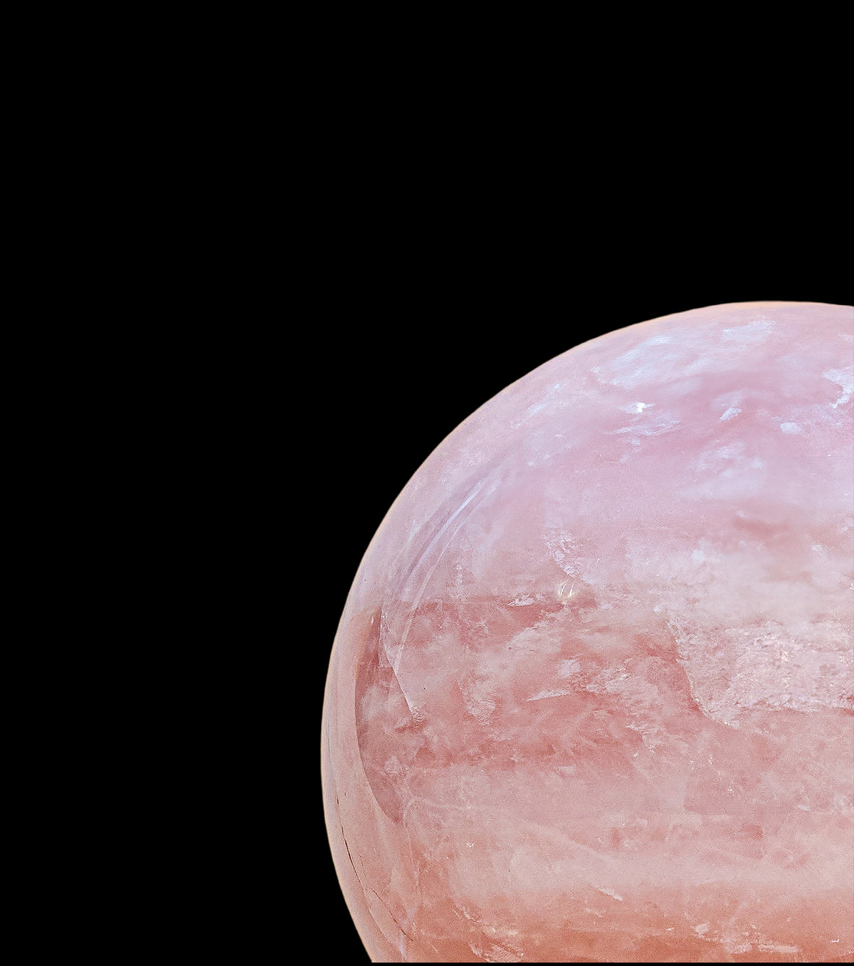Esfera de cuarzo rosa pulida